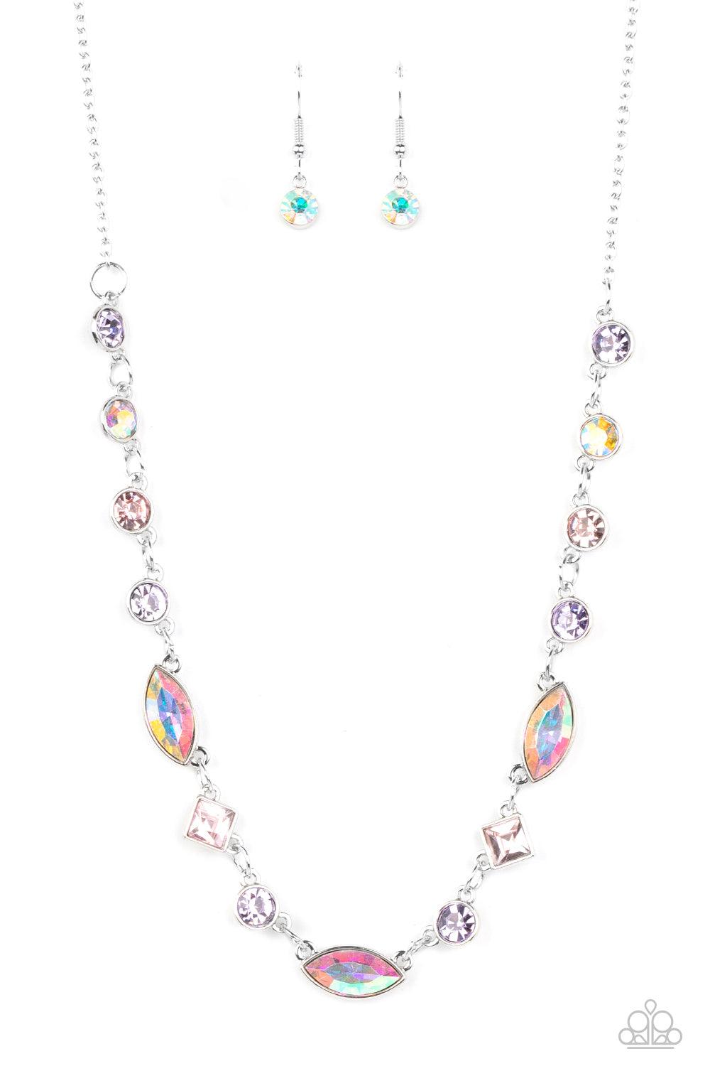 Paparazzi Accessories Irresistible HEIR-idescence - Multi Varying in geometric shapes and shades, glittery purple and pink gems are sprinkled between iridescent rhinestone accents for a dreamy refined, and irresistible finish. Features an adjustable clasp