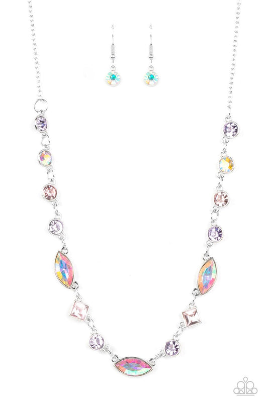 Paparazzi Accessories Irresistible HEIR-idescence - Multi Varying in geometric shapes and shades, glittery purple and pink gems are sprinkled between iridescent rhinestone accents for a dreamy refined, and irresistible finish. Features an adjustable clasp