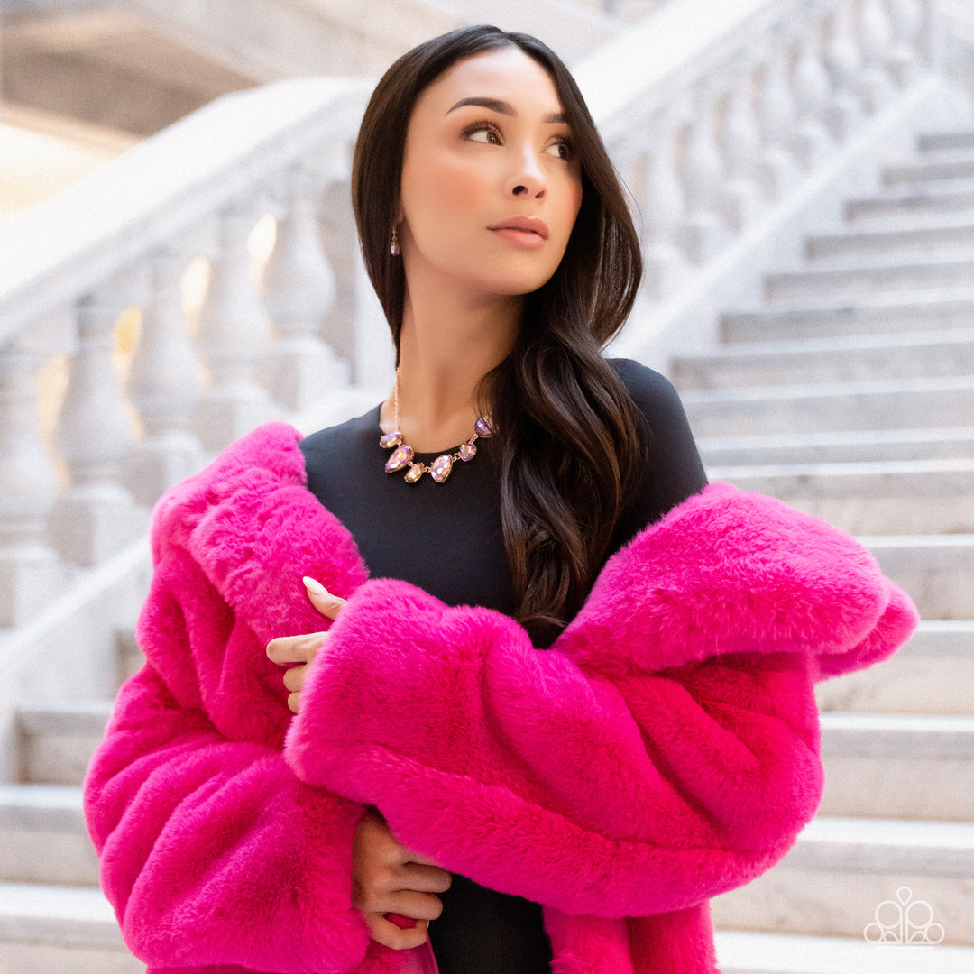 Paparazzi Accessories Otherworldly Opulence - Multi 2 Featuring a stellar iridescence, an oversized collection of glittery iridescent teardrop gems alternates upside down and right-side-up below the collar for an out-of-this-world sparkle. Features an adj