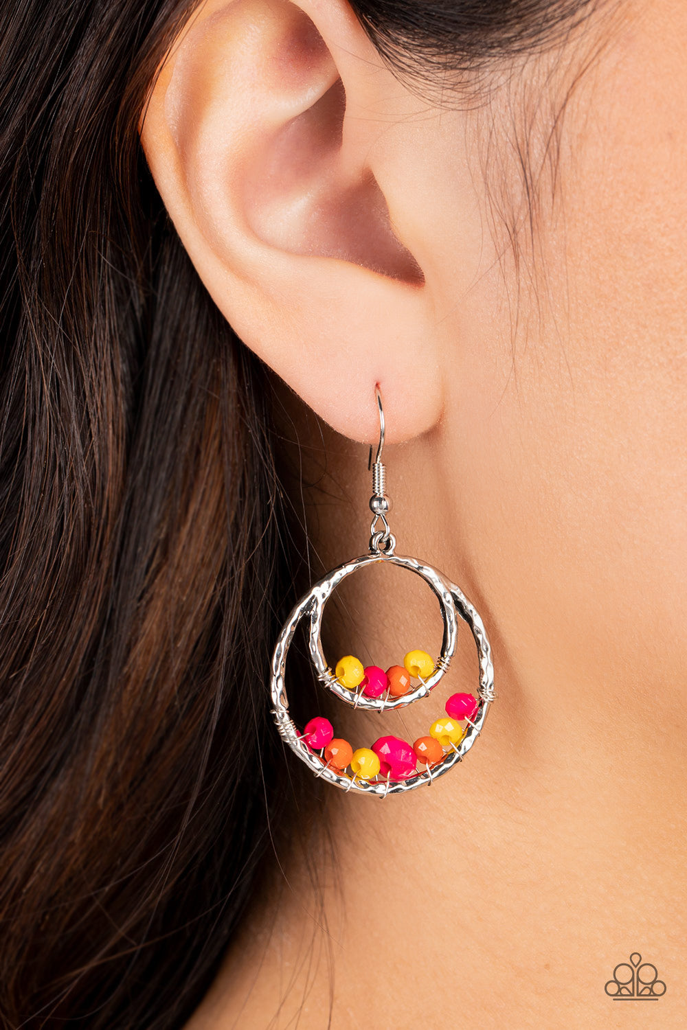 Paparazzi Accessories Bustling Beads - Multi A pair of airy silver circles are hammered in high sheen texture as they overlap inside one another. A row of vibrant multicolored beads lines the bottom of each circular frame, adding a bold pop of color. Earr