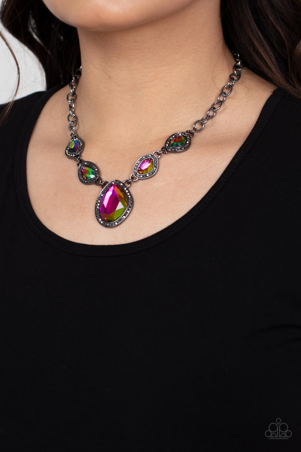 Paparazzi Accessories The Upper Echelon - Multi Bordered in gunmetal frames dotted with tiny flecks of hematite rhinestones, a pair of asymmetrical gems with an oil-spill finish delicately link into a spellbinding sparkle around the neck. Features an adju