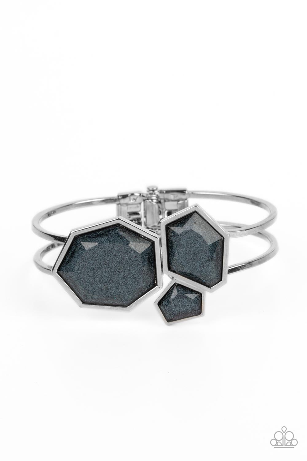 Paparazzi Accessories Tourist TRAPEZOID - Multi Three glassy geometric beads with sharp angular edges and faceted surfaces meet at the ends of curved bands of silver to create a cuff. Glittery shimmer runs through each of the rich black gems, adding a hin