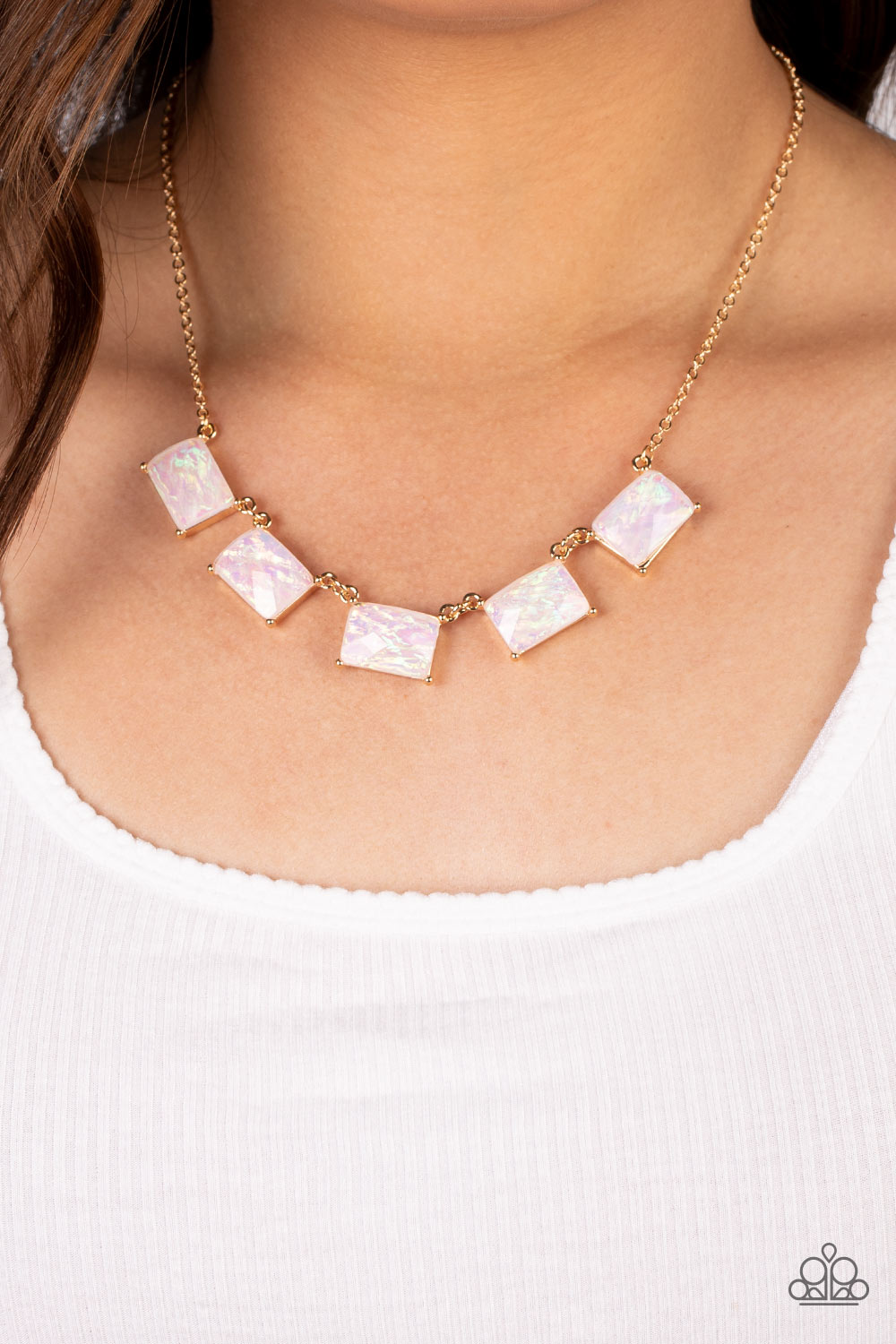 Paparazzi Accessories Opalescent Oblivion - Gold Featuring a refracted shimmer and an opalescent finish, a collection of emerald-cut, white gems link along the collar to create a hypnotic pop of color. Each gem is pressed into a gold frame with pronged fi