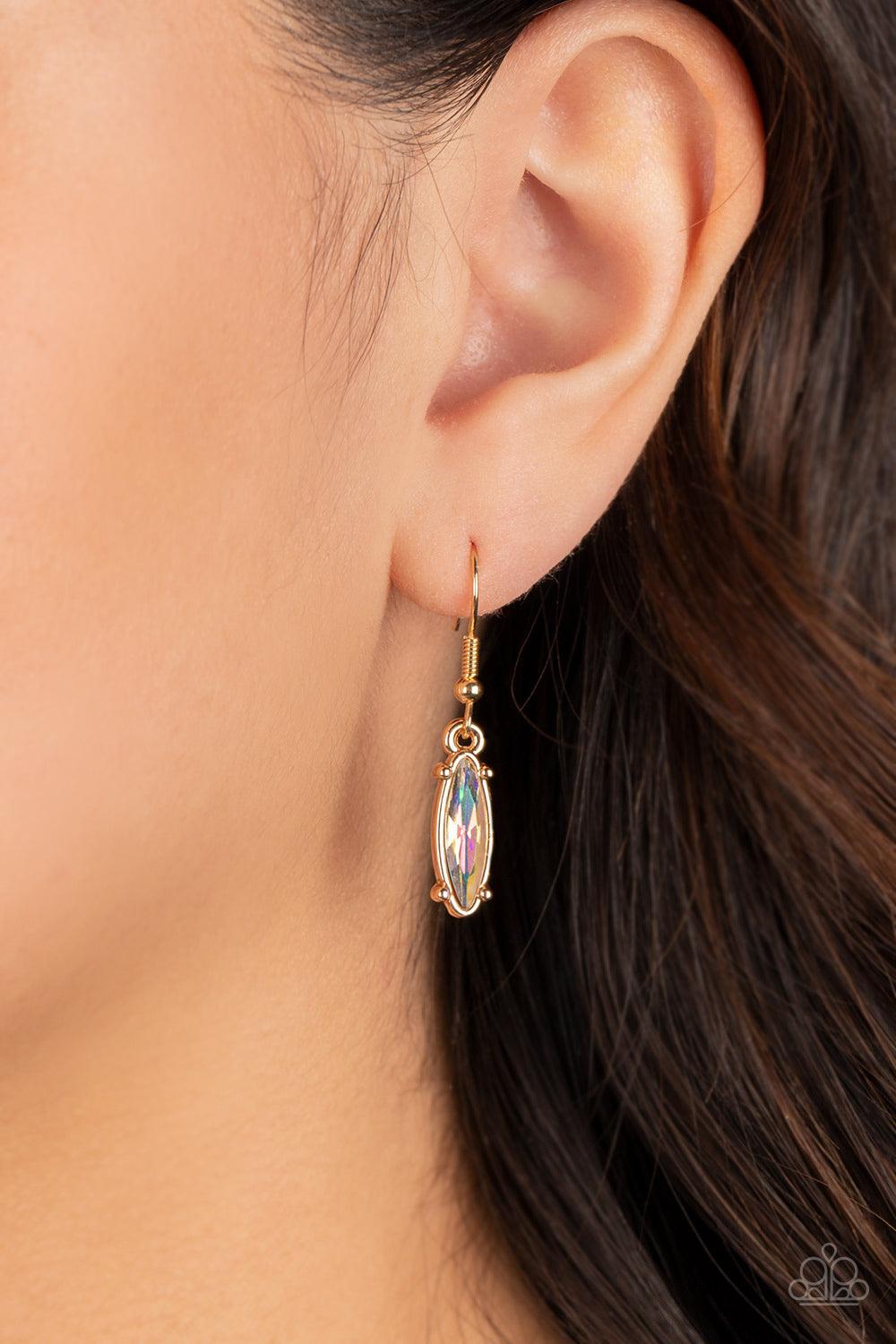 Paparazzi Accessories Celestial Cruise - Gold Featuring oblong marquise cuts, a collection of iridescent gems join into leafy gold frames below the collar. Radiating with the same iridescent intensity, even more stellar rhinestones fan out into a circular