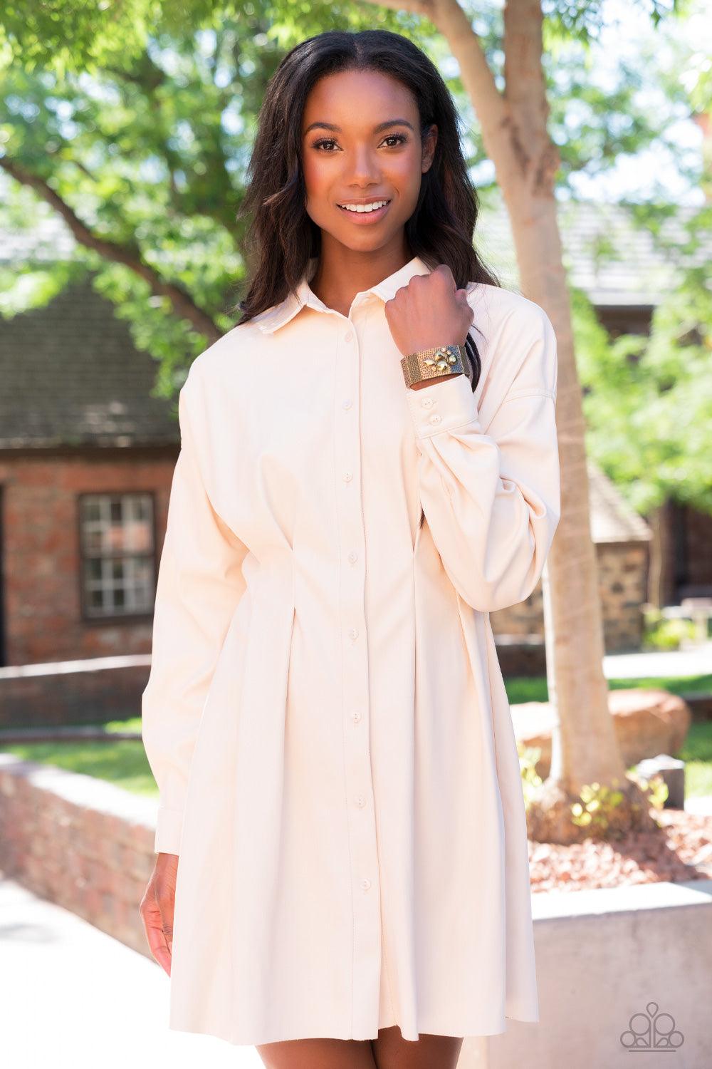 Paparazzi Accessories Flickering Fortune - Brass Hammered in gritty shimmer, rustic, rectangular, brass frames are threaded along stretchy bands that wrap around the wrist. Mismatched topaz, iridescent, and aurum rhinestones cluster on the front and back