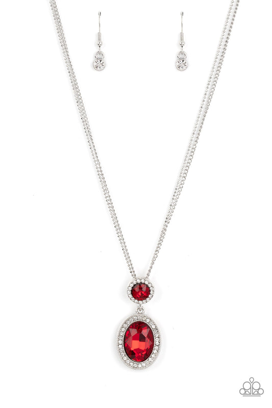 Paparazzi Accessories Castle Diamonds - Red A large oval red rhinestone is encased in a border of rhinestone-dusted silver, as it's suspended from a smaller version of the same design. The stacked pendant then slides along a pair of silver chains in a reg
