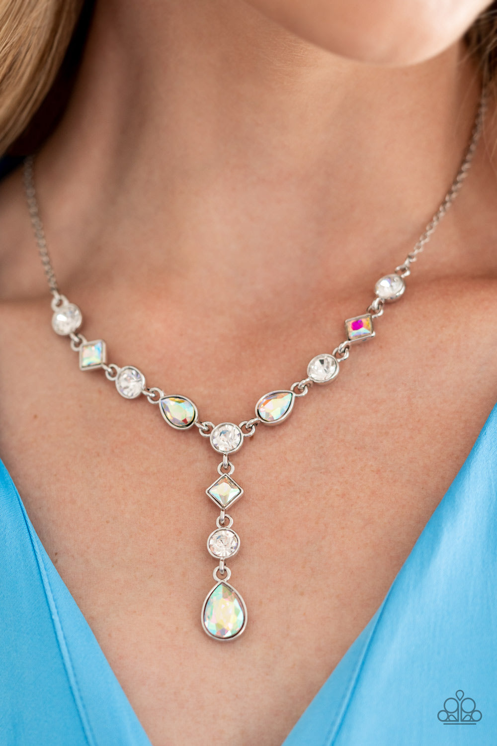 Paparazzi Accessories Forget the Crown - Multi Brilliant white round-cut rhinestones alternate between diamonds and teardrops with an iridescent finish, creating an elegant lariat fit for royalty. Due to its prismatic palette, color may vary. Features an