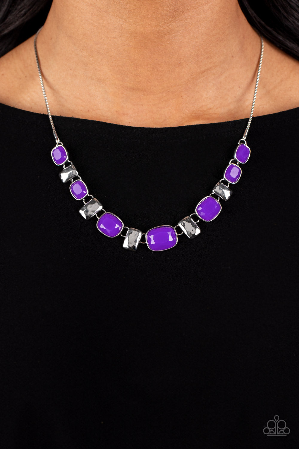 Paparazzi Accessories Polished Parade - Purple Rounded rectangular beads in a vibrant purple hue are pressed into silver frames, showcasing their faceted surfaces as they crawl along the collar. Small rectangular plates, hammered in subtle texture, shimme