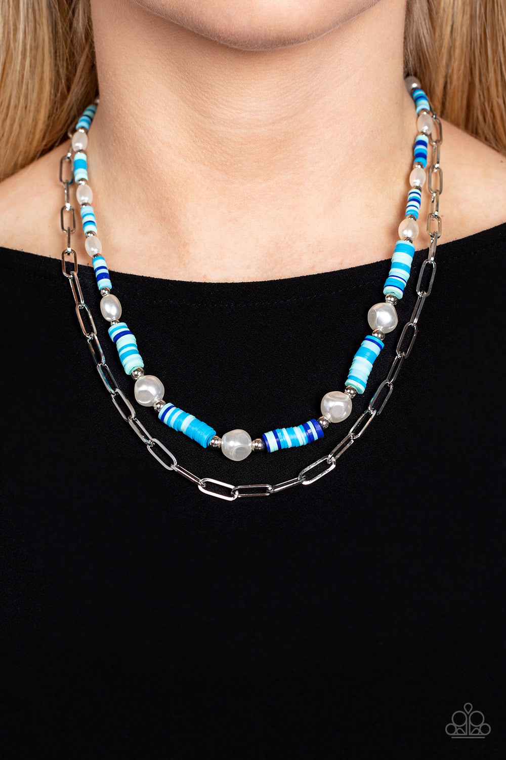 Paparazzi Accessories Tidal Trendsetter - Blue Sections of colorful rubber discs in shades of blue, turquoise, and navy are separated by tiny silver beads and a variety of white baroque pearls to create an unexpected mashup of texture along the collar. A