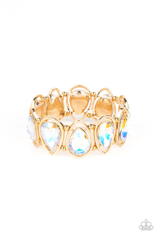 Paparazzi Accessories The Sparkle Society - Gold Oversized teardrop gems, coated in a shimmery iridescent finish are seemingly suspended inside gold teardrop frames. The airy borders allow the faceted edges of the iridescent beads to take center stage, as