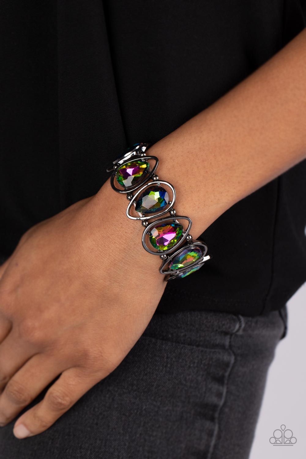 Paparazzi Accessories The Sparkle Society - Multi 2 Oversized teardrop gems, coated in a shimmery oil spill finish are seemingly suspended inside gunmetal teardrop frames. The airy borders allow the faceted edges of the teardrop beads to take center stage