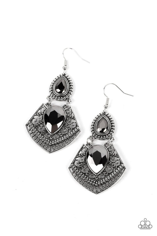 Paparazzi Accessories Royal Remix - Silver A hematite teardrop gem is pressed into a flared silver frame swirled in intricate patterns. The flared frame swings below a smaller hematite teardrop that is wrapped in a border of silver studs, creating a swing