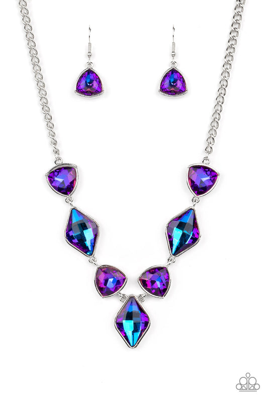 Paparazzi Accessories Glittering Geometrics - Purple Set in silver frames, glittering geometric purple shapes with a UV shimmer delicately coalesce around the collar for a statement piece. Features an adjustable clasp closure. Due to its prismatic palette
