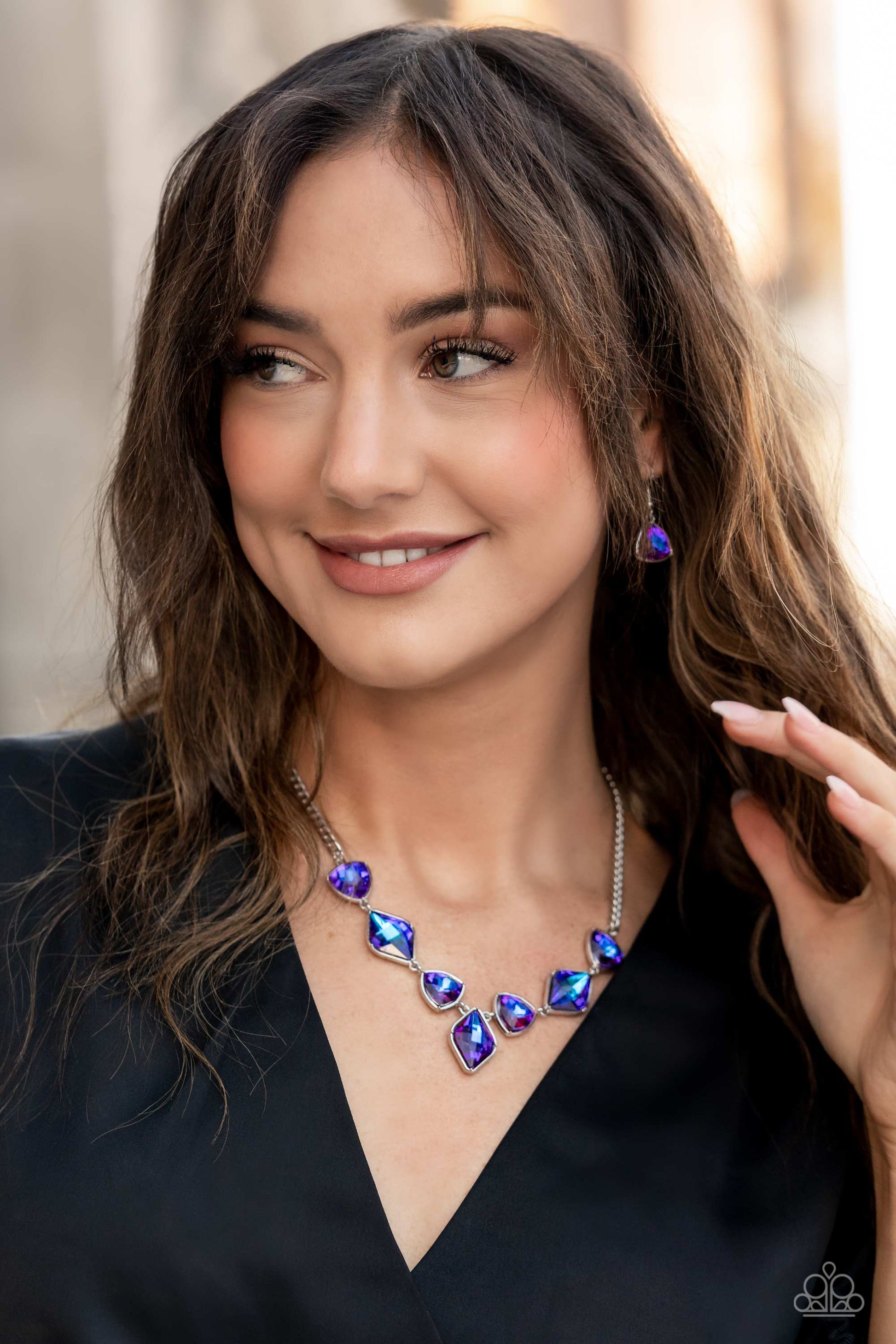 Paparazzi Accessories Glittering Geometrics - Purple Set in silver frames, glittering geometric purple shapes with a UV shimmer delicately coalesce around the collar for a statement piece. Features an adjustable clasp closure. Due to its prismatic palette