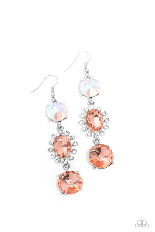 Paparazzi Accessories Magical Melodrama - Multi A trio of colorfully iridescent and brilliantly sparkling peach gems are linked together as they fall glamorously from the ear. A round-cut gem with an exaggerated faceted surface anchors the cascade, follow