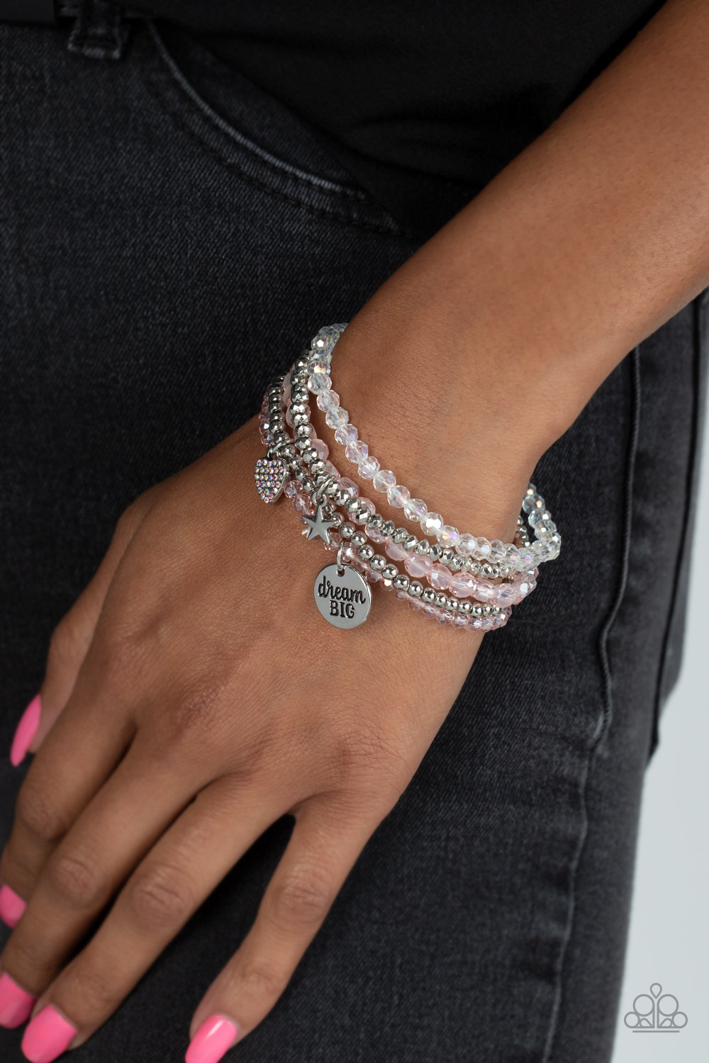 Paparazzi Accessories Teenage DREAMER - Pink Reflective pink, defaced silver, reflective white, and smooth silver beads wrap around stretchy bands, and combine into a colorful stack along the wrist. The reflective, pink-beaded bracelet features a silver p