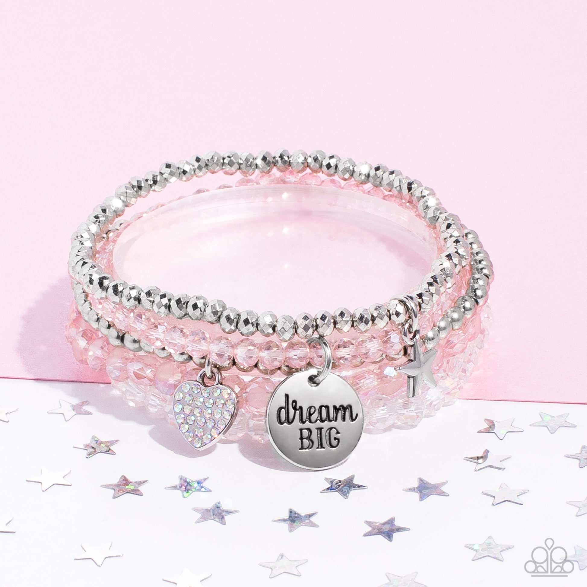 Paparazzi Accessories Teenage DREAMER - Pink Reflective pink, defaced silver, reflective white, and smooth silver beads wrap around stretchy bands, and combine into a colorful stack along the wrist. The reflective, pink-beaded bracelet features a silver p