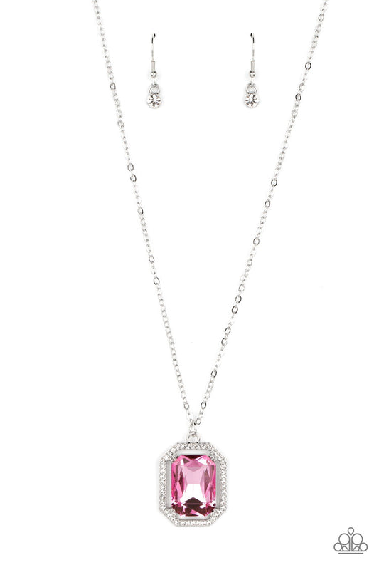 Paparazzi Accessories Galloping Gala - Pink A dramatically oversized, emerald-cut pink gem shimmers as it swings from the bottom of a long silver chain. Dainty white rhinestones create an airy frame that wrap around the reflective centerpiece, scattering