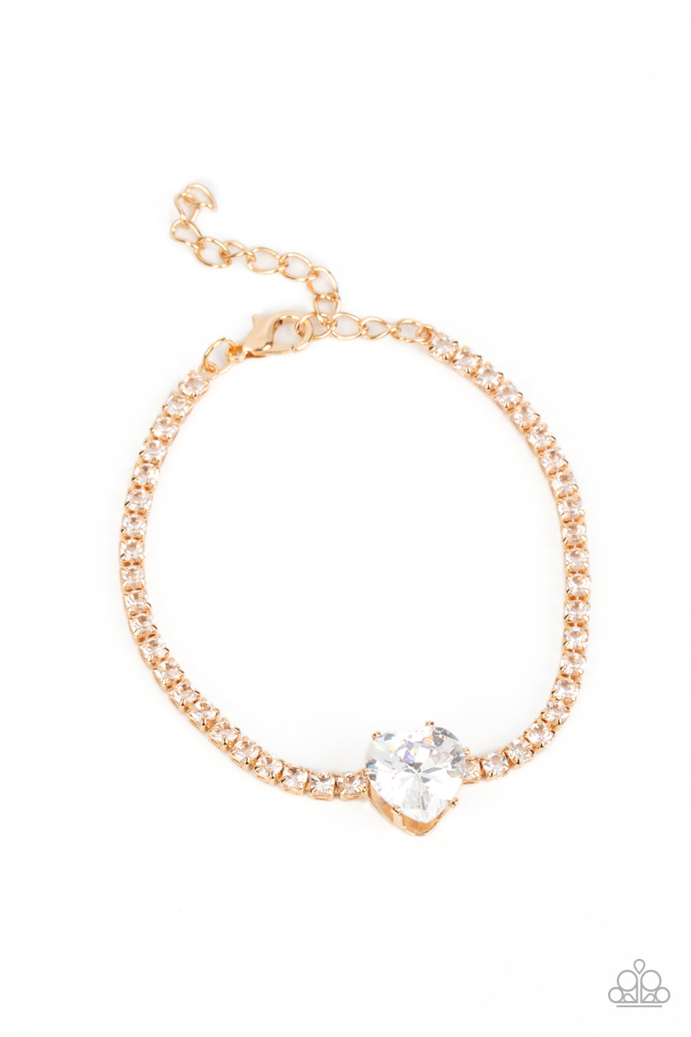 Paparazzi Accessories Bedazzled Beauty - Gold An oversized white heart-shaped gem, set in an airy, pronged gold fitting, glitters at the center of a blinding row of dainty, glassy white rhinestones set in square gold fittings, resulting in a flirtatious s
