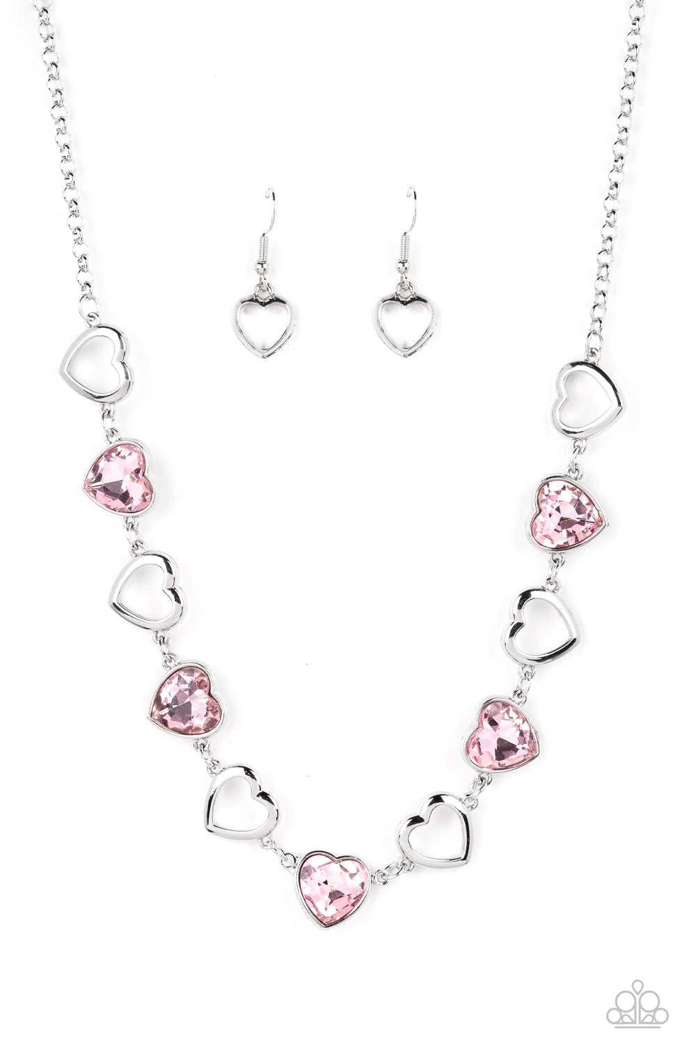 Paparazzi Accessories Contemporary Cupid - Pink Shiny, silver silhouette hearts alternate between faceted pink heart gems pressed into silver frames.The high-sheen and sparkly display coalesce around the collar for a cupid-like charm. Features an adjustab