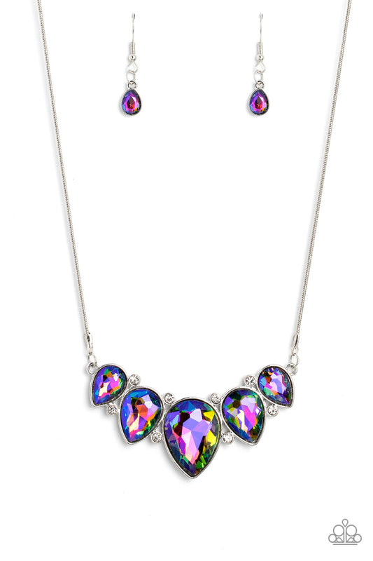 Paparazzi Accessories Regally Refined - Multi Featuring a stellar UV shimmer, dramatic teardrop gems, gliding from a sleek, silver snake chain, are pressed into high-sheen silver casings, creating a colorful fringe below the collar. Linking each teardrop