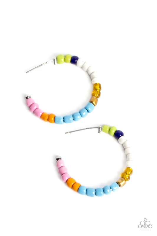 Paparazzi Accessories Multicolored Mambo - Multi A colorful strand of green, royal blue, white, reflective yellow, gold, blue, orange, and pink seed beads follow the curve of a silver hoop, creating a colorfully charismatic look. Earring attaches to a sta