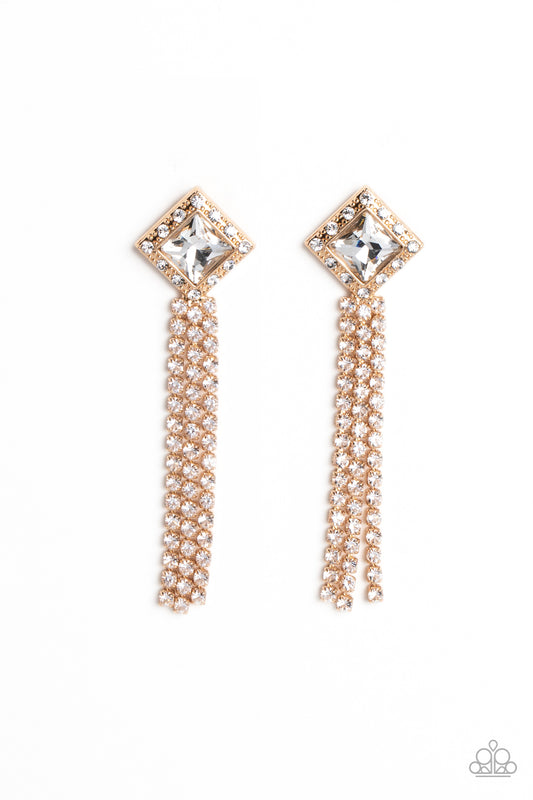 Paparazzi Accessories Seasonal Sparkle - Gold A brilliant, square-cut white rhinestone is bordered by tiny sparkling accents and tilted on a point against a gold backdrop, creating a dramatic anchoring point from which streams of glittery, square-cut rhin