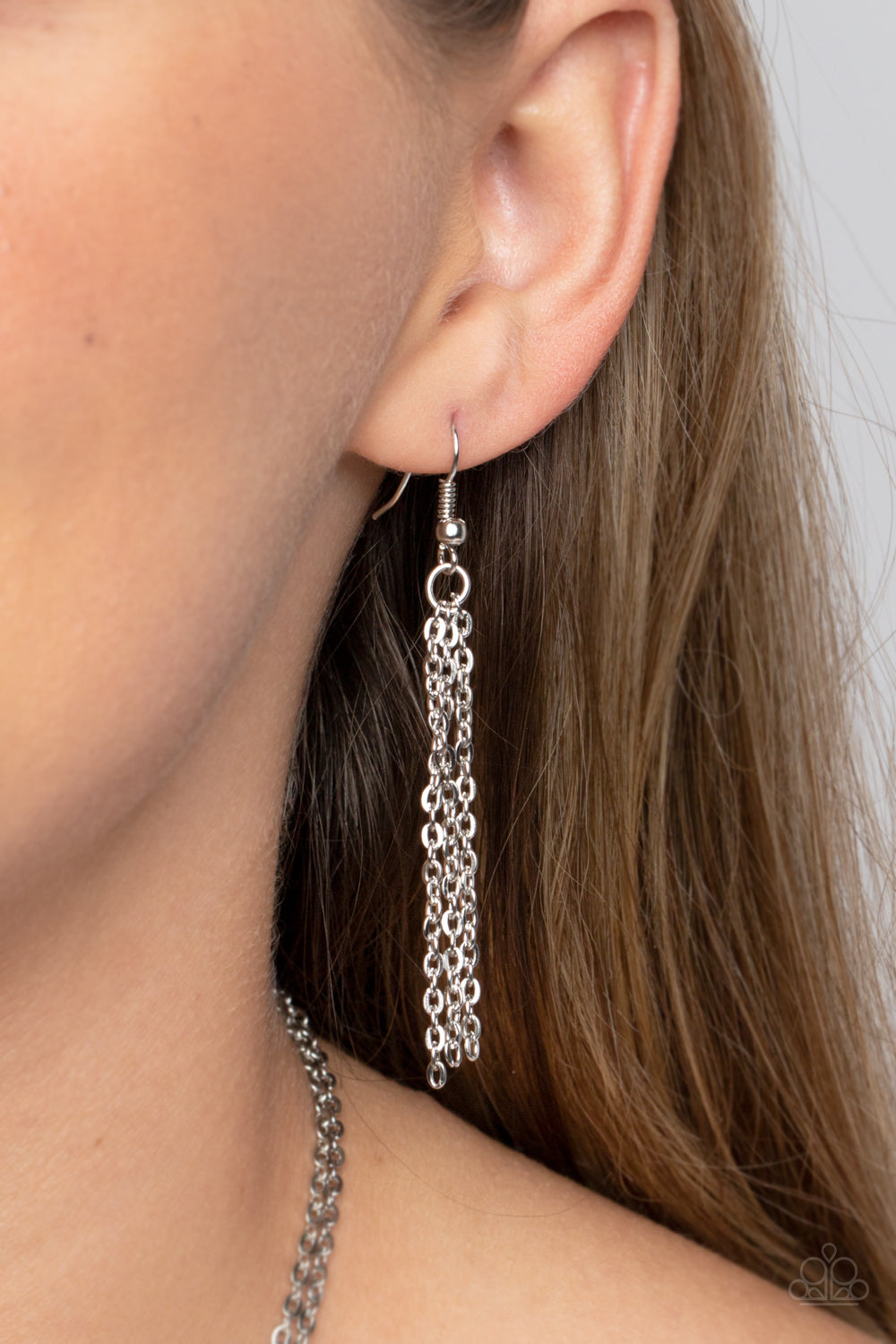 Paparazzi Accessories Crystal Catwalk - Pink Chiseled into a colorful collection, two layers of transparent pink crystal-like stones swings from the bottom of two dainty silver chains for a handcrafted, artisanal look. Features an adjustable clasp closure