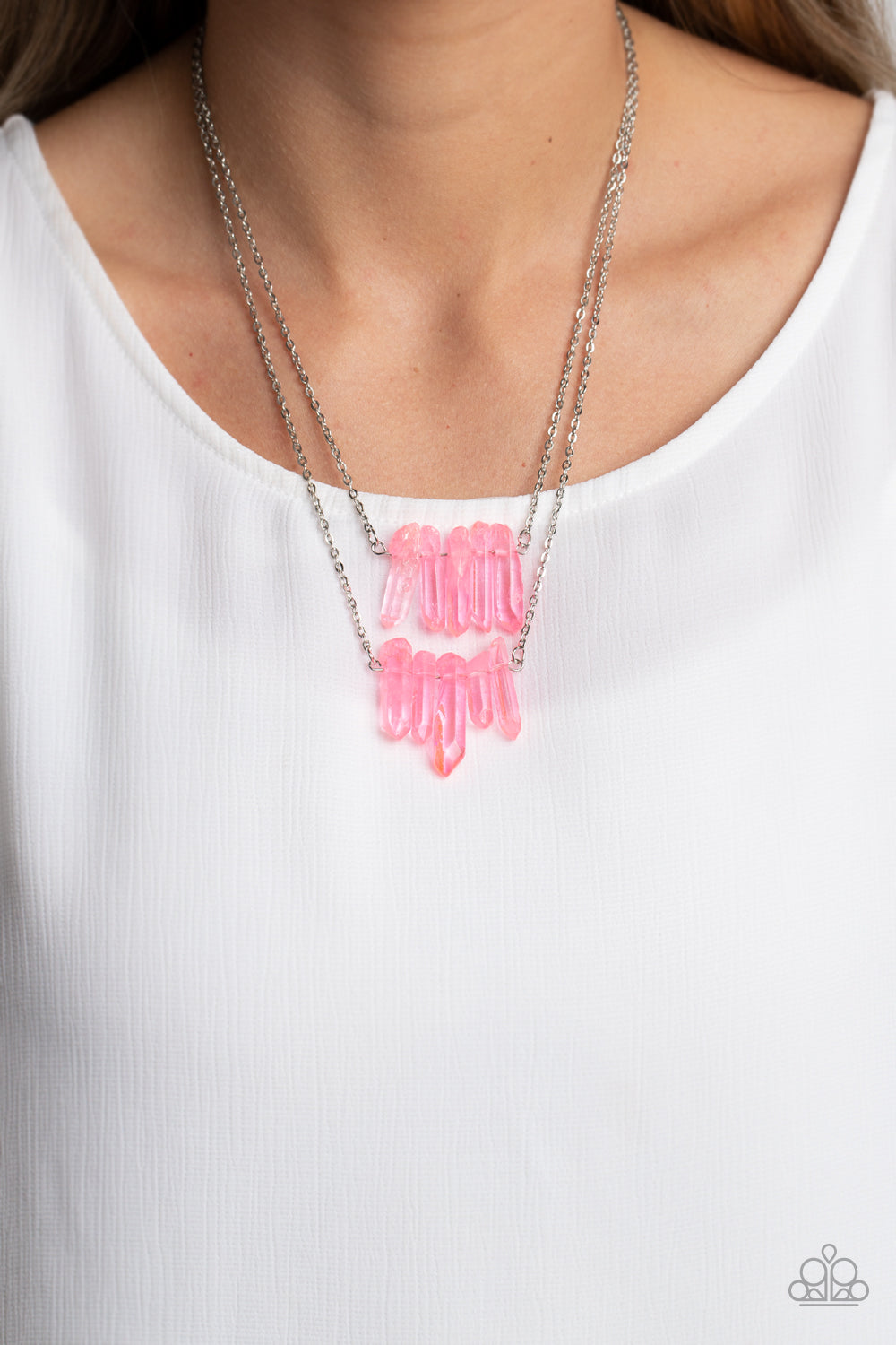 Paparazzi Accessories Crystal Catwalk - Pink Chiseled into a colorful collection, two layers of transparent pink crystal-like stones swings from the bottom of two dainty silver chains for a handcrafted, artisanal look. Features an adjustable clasp closure