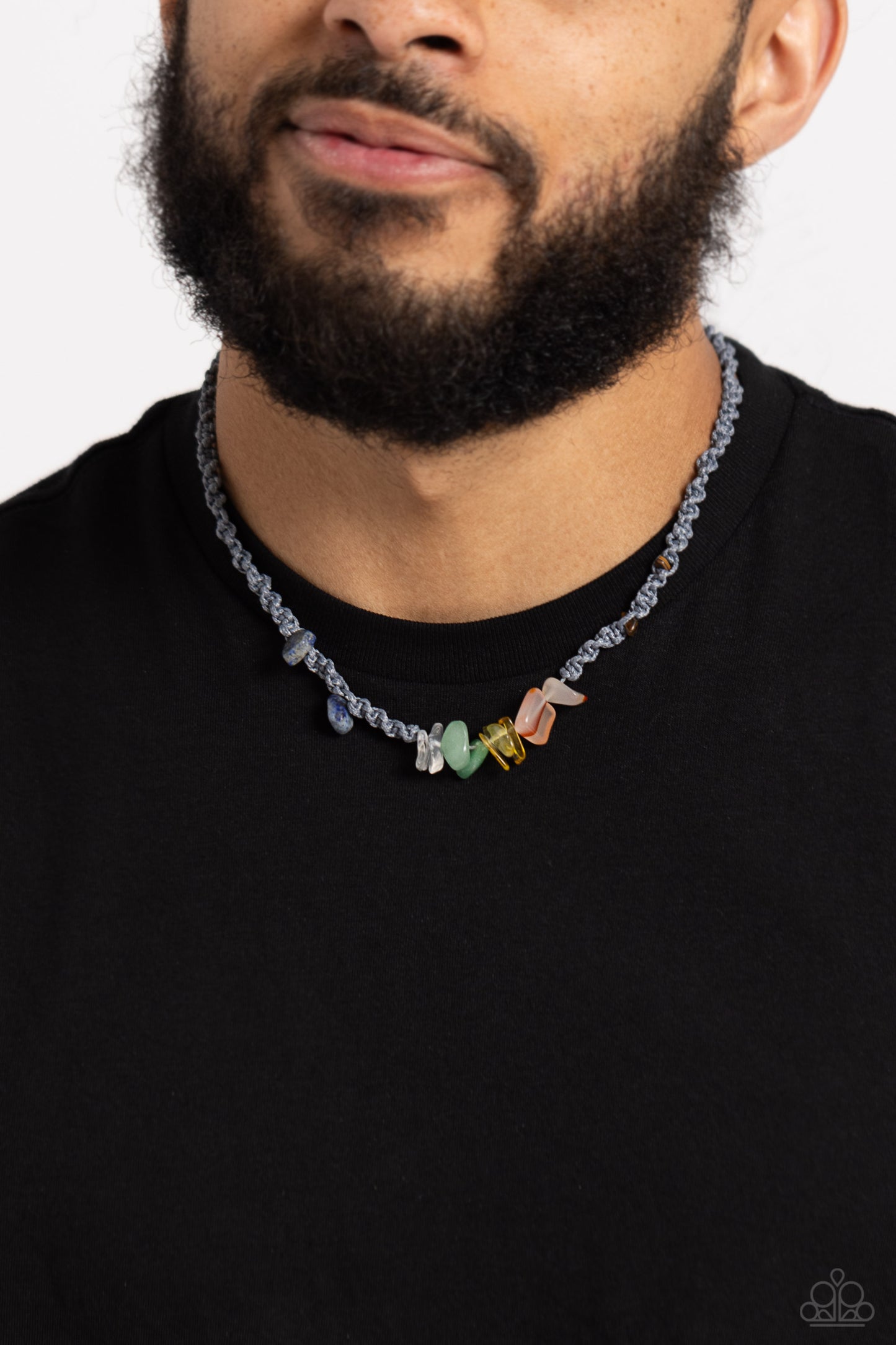 Paparazzi Accessories Chiseled Craving - Silver Braided gray cording knots around a chiseled, multicolored collection of stones, including amethyst, jade, lapis, Tiger's eye, and others, for an urban explosion of color below the collar. Features a button