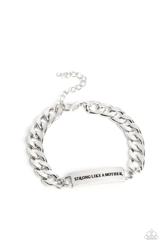 Paparazzi Accessories Mighty Matriarch - Silver Attached to a thick, silver curb chain, a rectangular plate is stamped with the phrase "strong like a mother," for a sentimental, urban statement around the wrist. Features an adjustable clasp closure. Sold