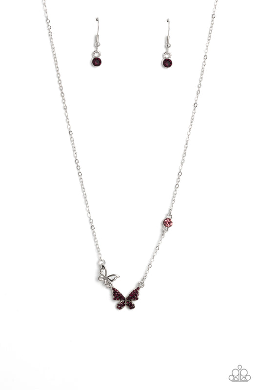 Paparazzi Accessories Cant BUTTERFLY Me Love - Purple A silver butterfly, dotted in dainty amethyst rhinestones, hangs from the bottom of a dainty silver chain. A smaller, airy silver butterfly appears to be in mid-flight as it's tilted to its side and be