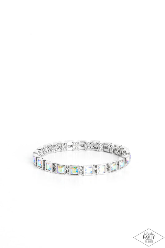 Paparazzi Accessories A GLAM Of Few Words - Multi Chiseled into elegant squares, glittery iridescent gems are nestled into sleek silver frames and threaded along elastic stretchy bands for a refined look. Due to its prismatic palette, color may vary. Sold