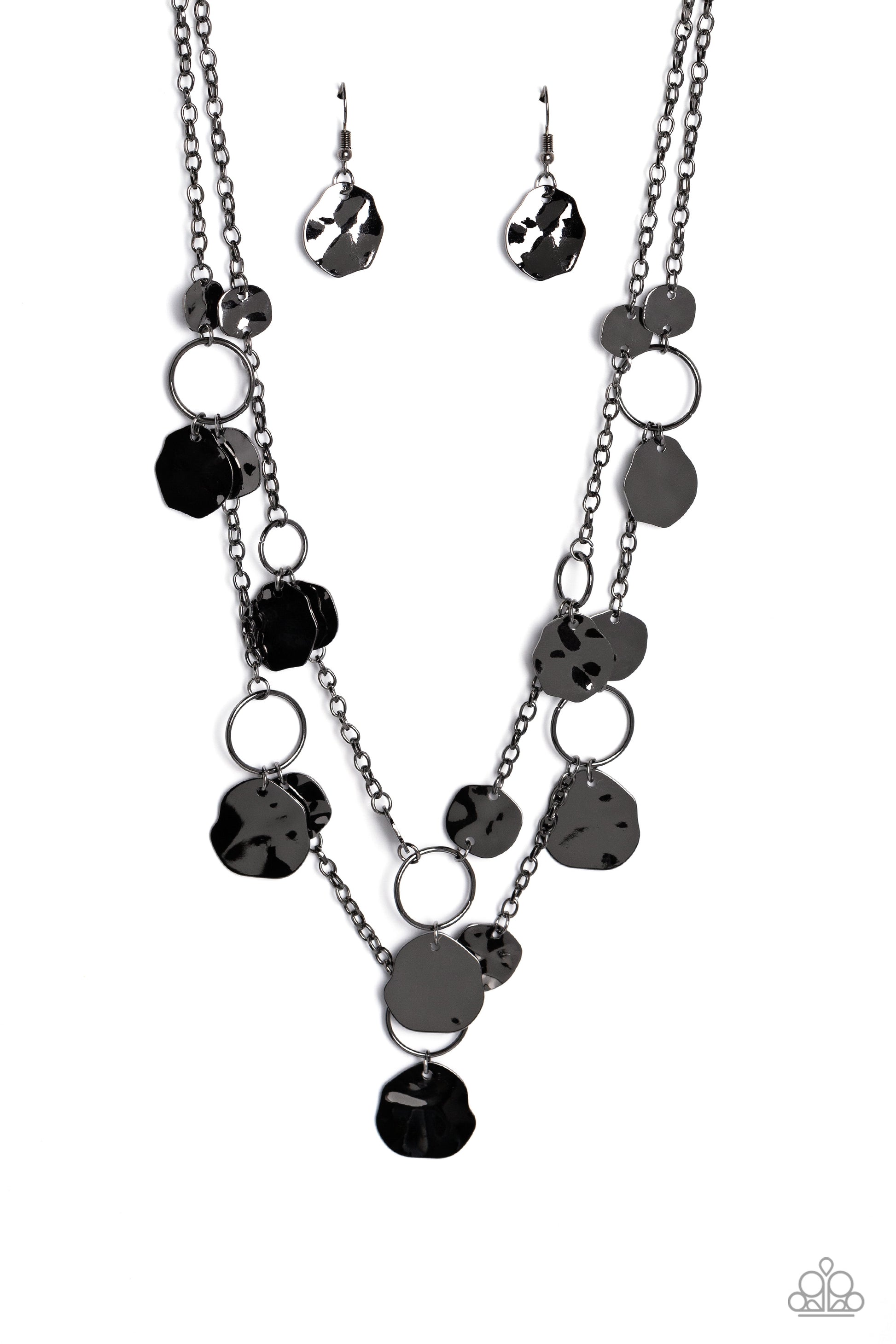 Paparazzi Accessories Hammered Horizons - Black Infused along a double-stranded gunmetal chain, smooth gunmetal hoops and abstract, hammered gunmetal discs fall down the neckline for an edgy, boisterous display. Features an adjustable clasp closure. Sold