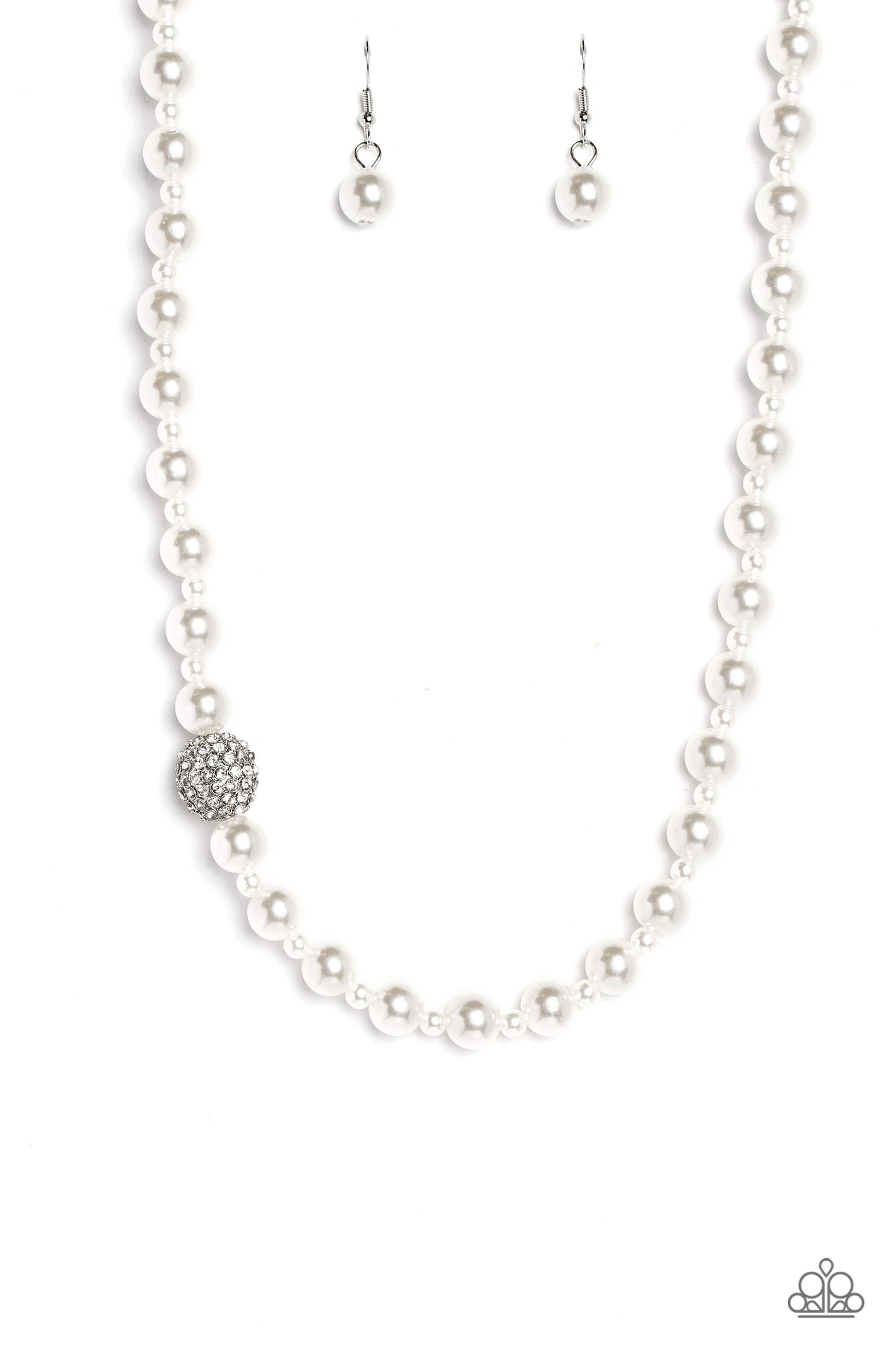 Paparazzi Accessories Countess Chic - White Strung along the entirety of an invisible wire, classic white pearls in varying sizes coalesce down the neckline for a refined finish. Adding to the elegant design, a sparkly white rhinestone-encrusted silver or