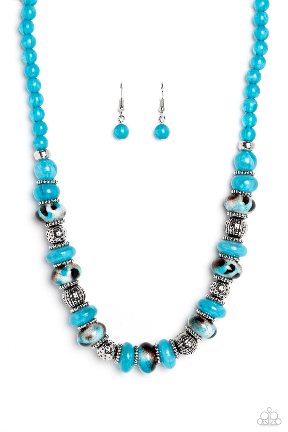 Paparazzi Accessories Warped Whimsicality - Blue An earthy collection of dotted silver beads, rounded milky turquoise beads, studded silver rings, turquoise-spotted ceramic-like beads and textured silver beads are threaded along an invisible wire below th