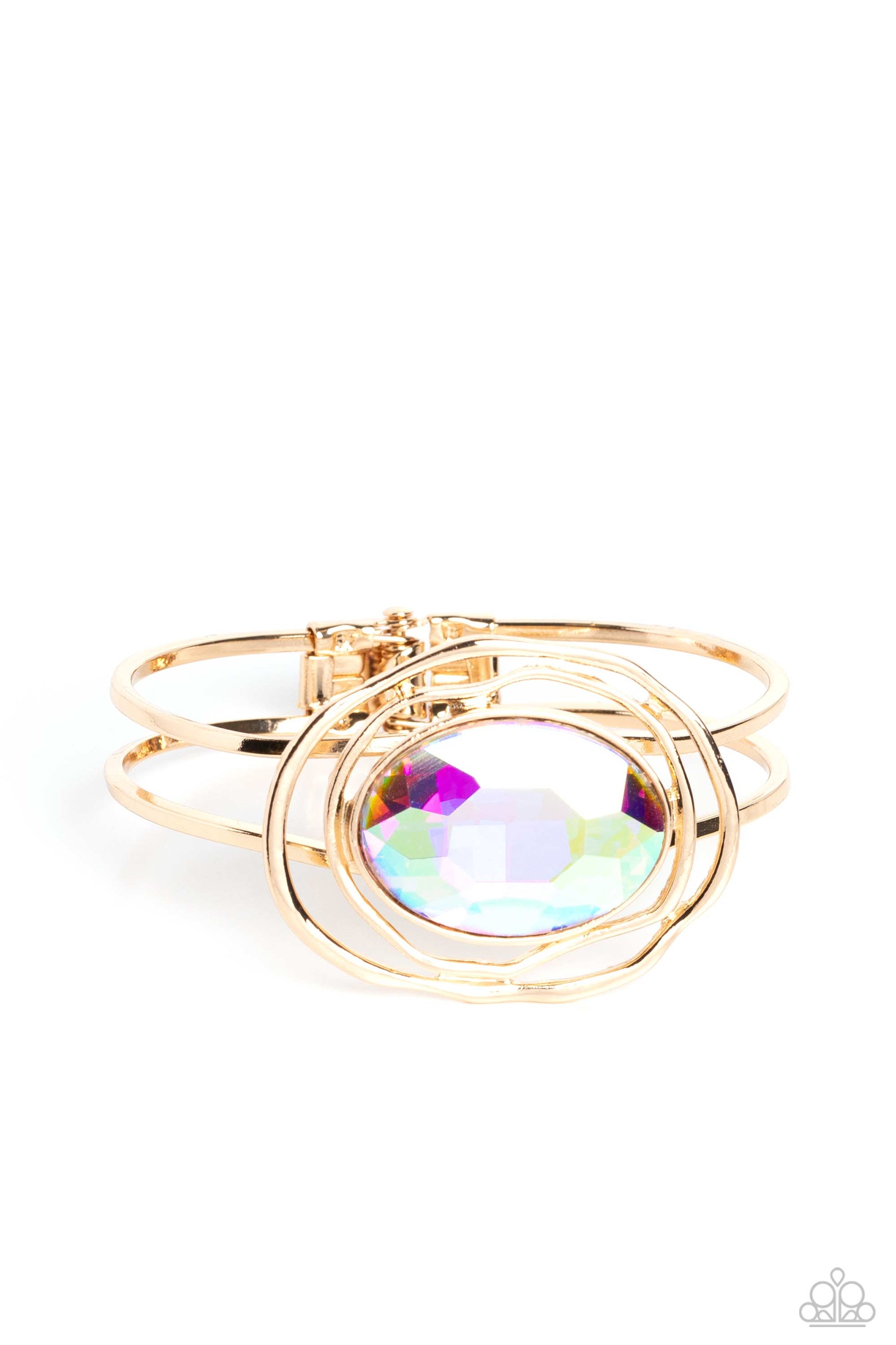 Paparazzi Accessories Substantial Sorceress - Multi Featured in the center of airy, shiny gold bands, an oversized, faceted iridescent oval gem rests atop the wrist for a dazzling pop of color. Warped, shiny gold rings seemingly float around the sparkly g