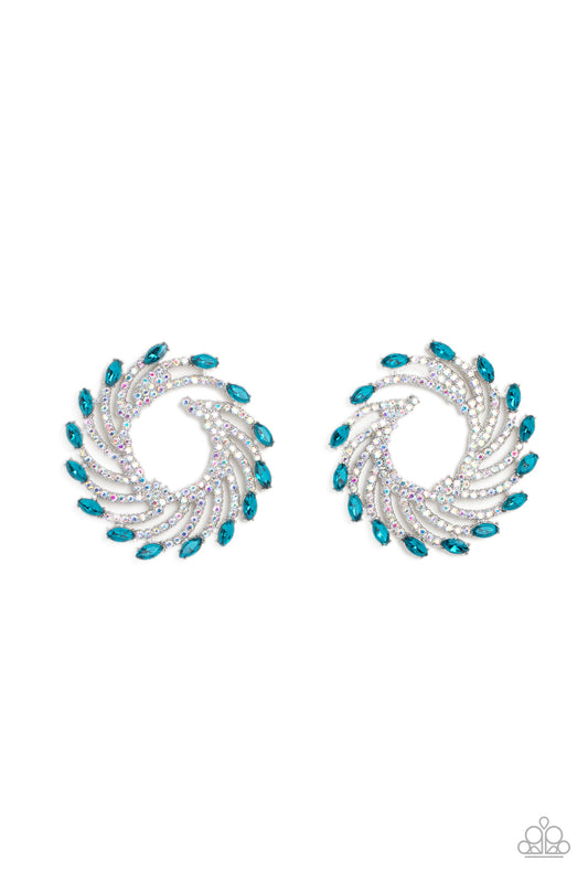Paparazzi Accessories Firework Fanfare - Blue Shimmery strands of silver spin out from an airy center, creating an exaggerated firework-like display at the ear. An explosion of dainty iridescent rhinestones lines the swirls and curves of the shimmery disp