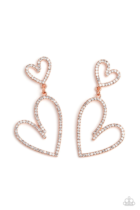 Paparazzi Accessories Doting Duo - Copper An oversized, rhinestone-encrusted shiny copper heart silhouette hangs from a smaller heart silhouette set in the same blinding shimmer for a romantic, eye-catching sparkle. Earring attaches to a standard post fit