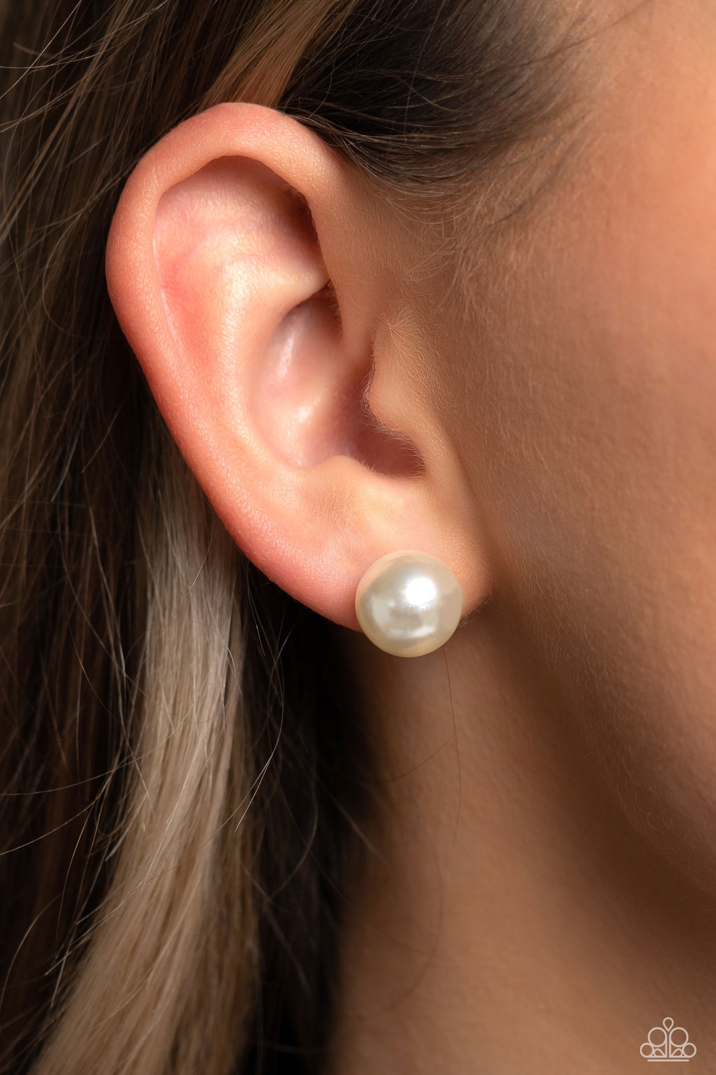 Paparazzi Accessories Debutante Details - White An oversized white pearl, stands out against the ear adding a timeless twist to a basic staple piece perfect for layering. Earring attaches to a standard post fitting. Sold as one pair of post earrings. Jewe
