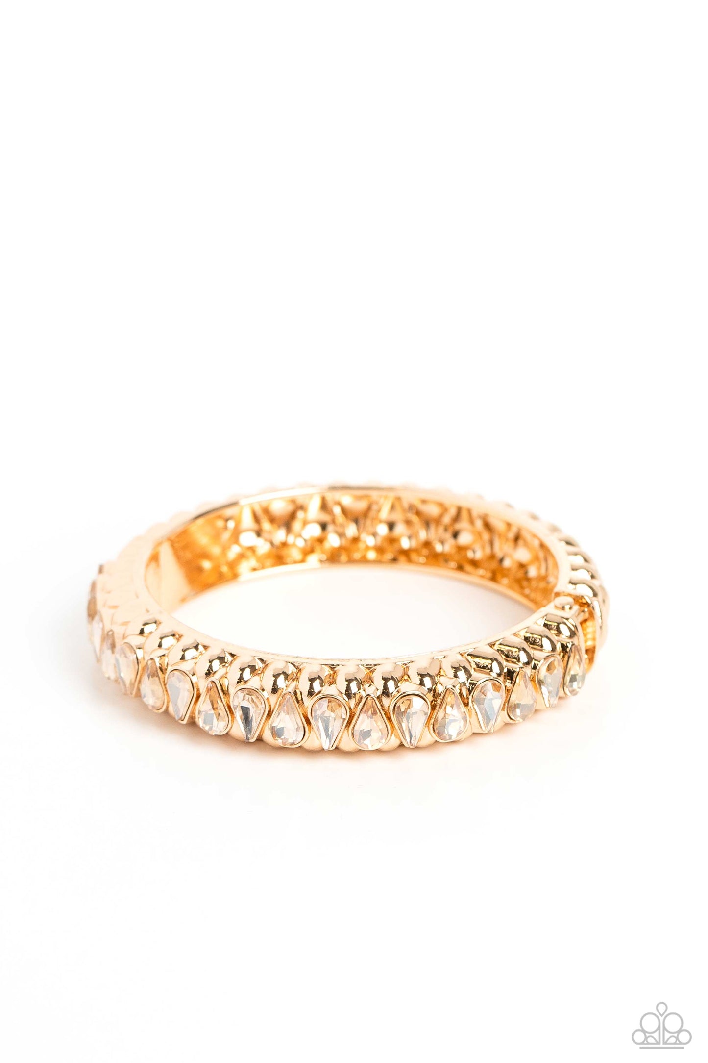 Paparazzi Accessories Crafted Coals - Gold A thick band of gold is embossed in a teardrop-shaped texture, as it wraps around the wrist to create a bold bangle with a hinged closure. A shock of sparkle adorns one side of the design, as glamorous teardrop-s
