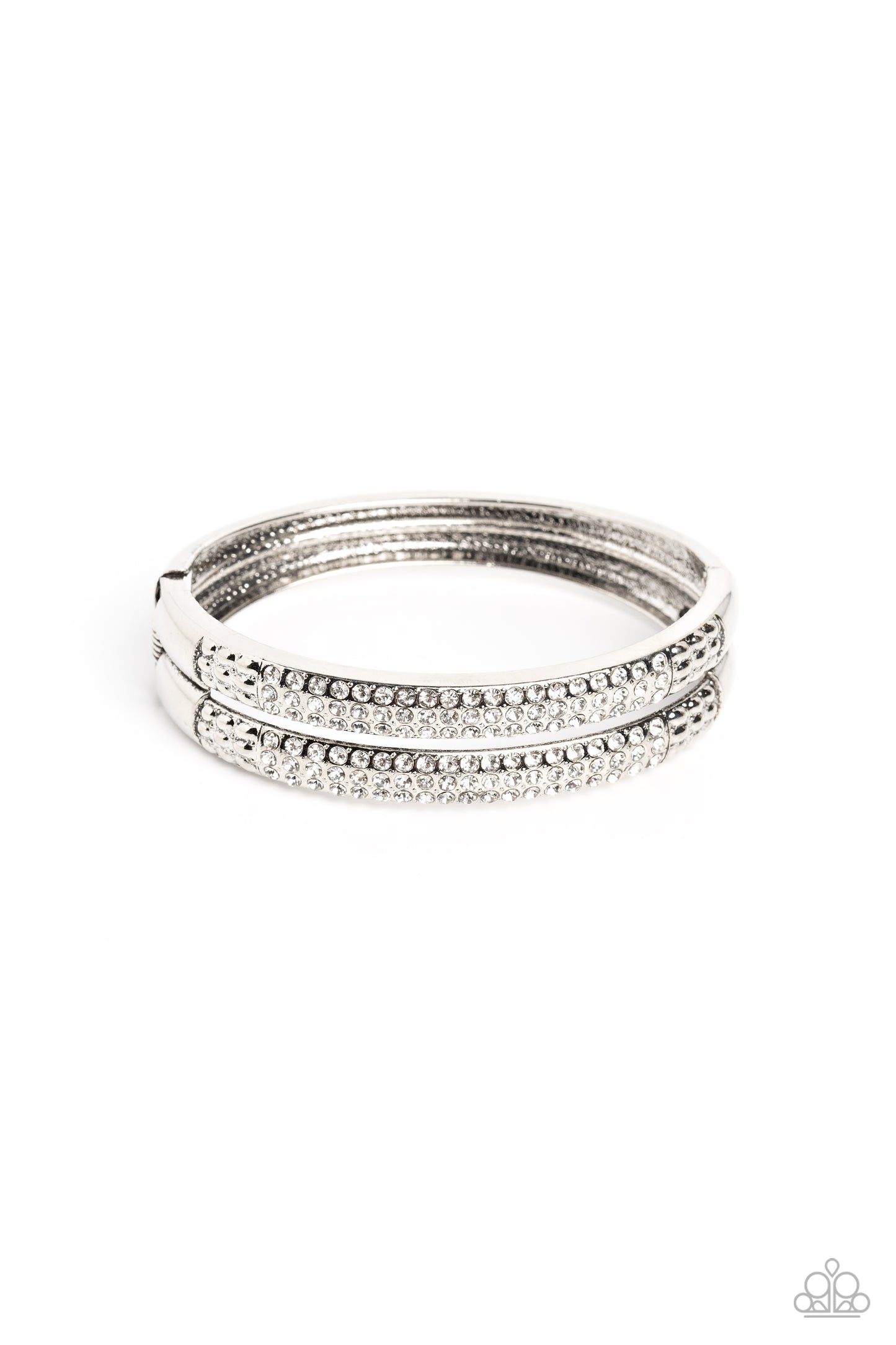 Paparazzi Accessories STACKED Up - White Three rows of dainty white rhinestones are encrusted along two thick silver layers as they stack upon the wrist. Rows of studded silver in a dot-motif border the glittery design for additional texture on the indust