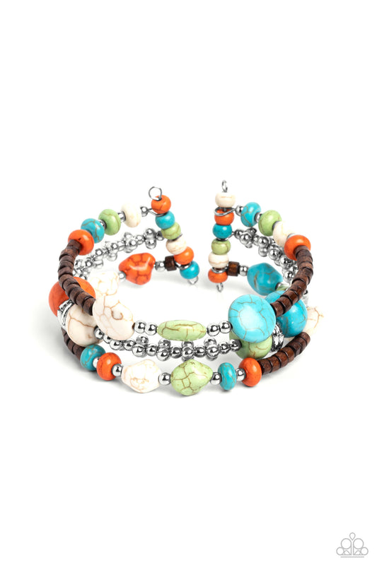 Paparazzi Accessories Operation Outdoors - Multi An earthy collection of brown wooden beads, classic silver beads and accents, and turquoise, orange, white, and apple green stones in varying sizes are threaded along invisible wires to create three bands t