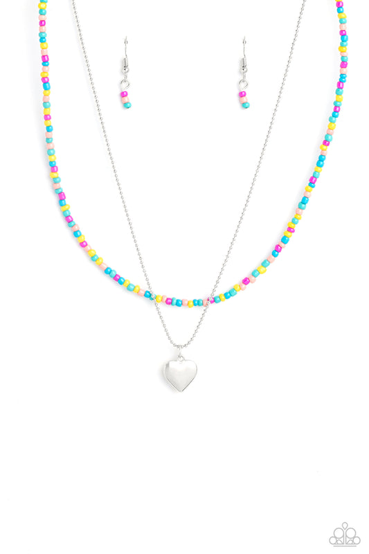 Paparazzi Accessories Candy Store - Multi Multicolored seed beads are threaded along a wire, falling along the collar in a capricious pattern. A delicate silver ball chain featuring a dangling silver heart pendant, layers together with the colorful beads