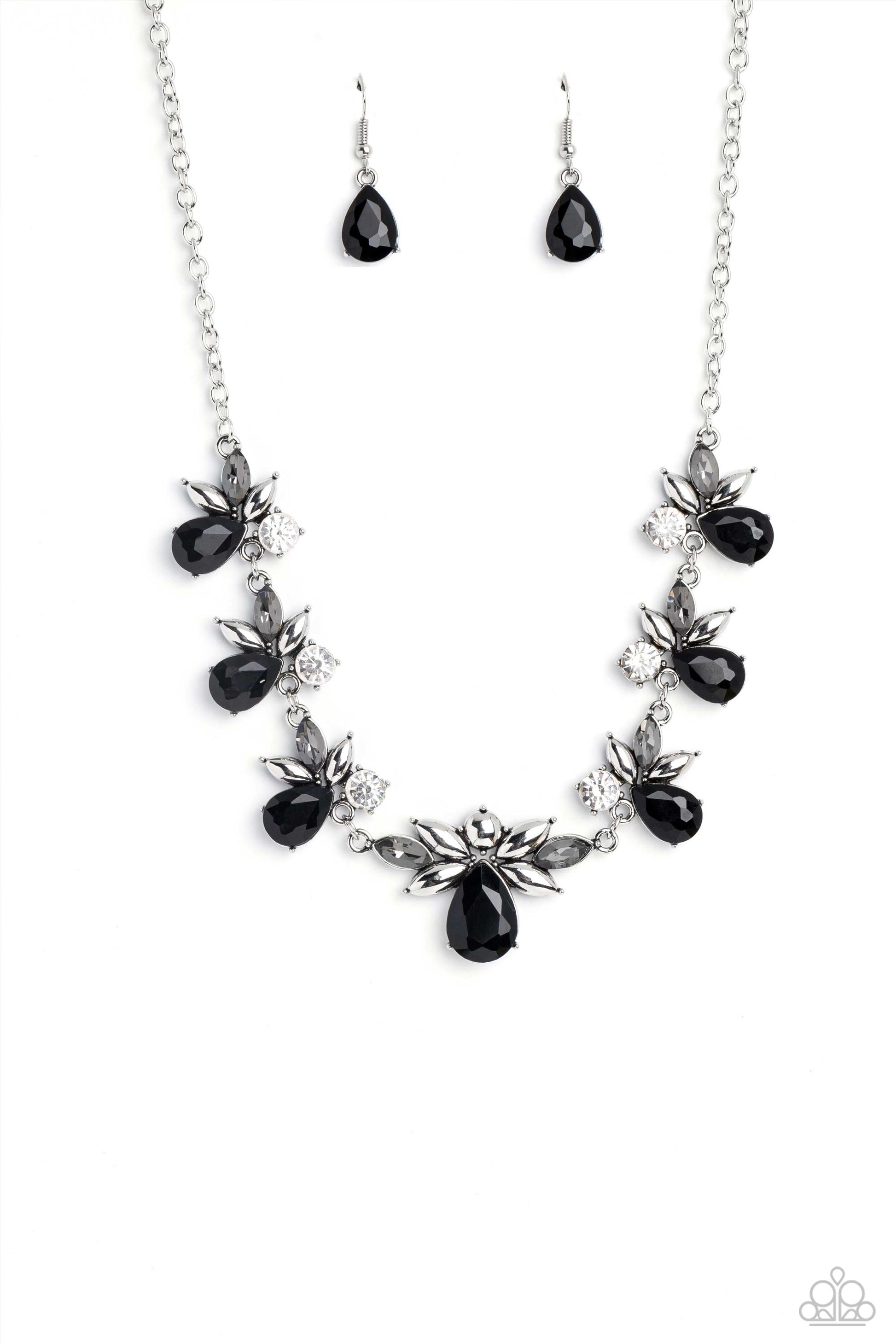 Paparazzi Accessories Explosive Effulgence - Black Black teardrops with explosions of white gems, and smoky marquise-cut gems fanning around it, elegantly trickle into refined clusters along a shimmery silver chain, creating a timeless geometric palette.