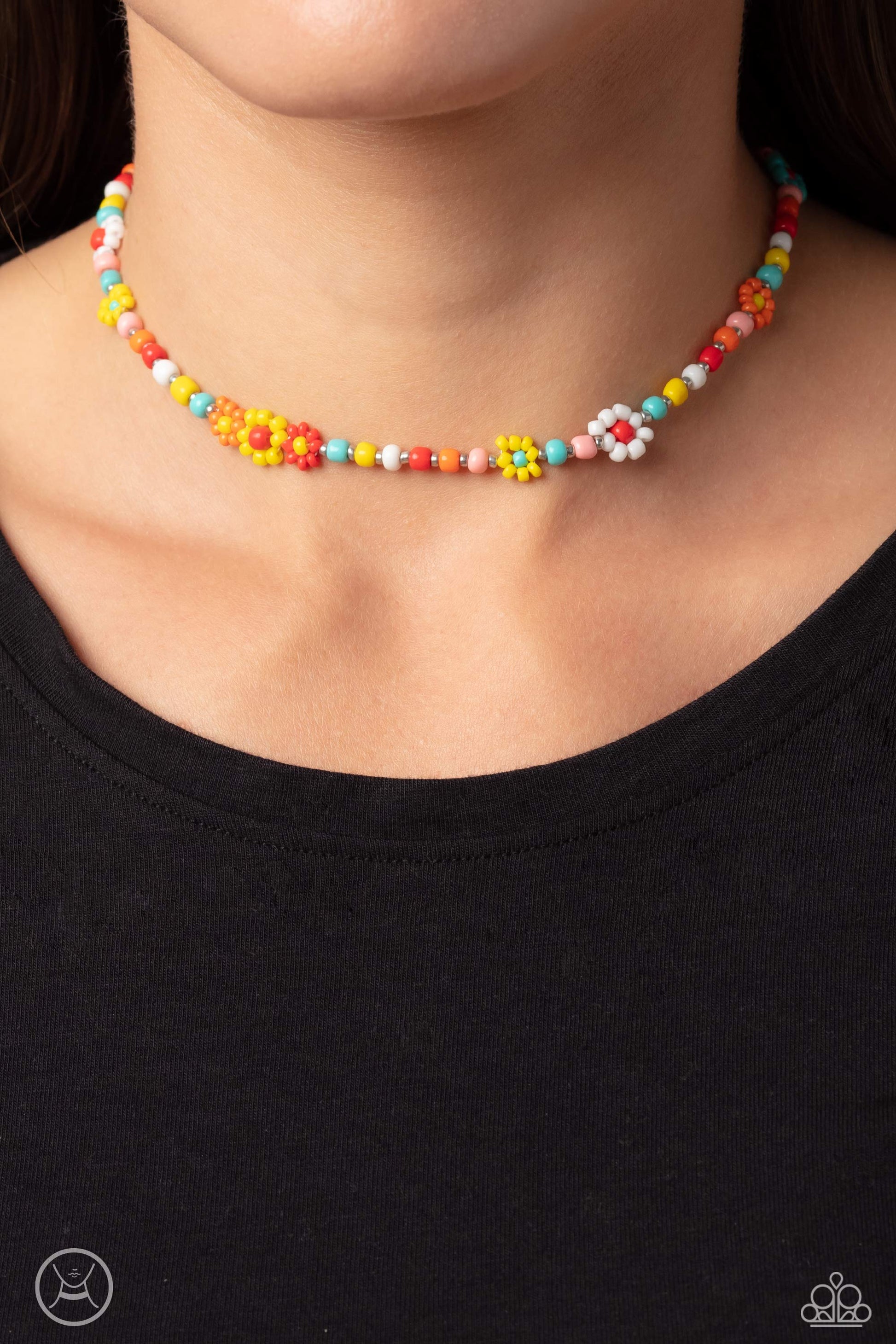 Paparazzi Accessories Flower Child Flair - Multi 1 Multicolored seed beads and silver accents are threaded along a wire, falling along the collar in a capricious pattern. Creating additional charm to the design, white, yellow, turquoise, orange, red, and