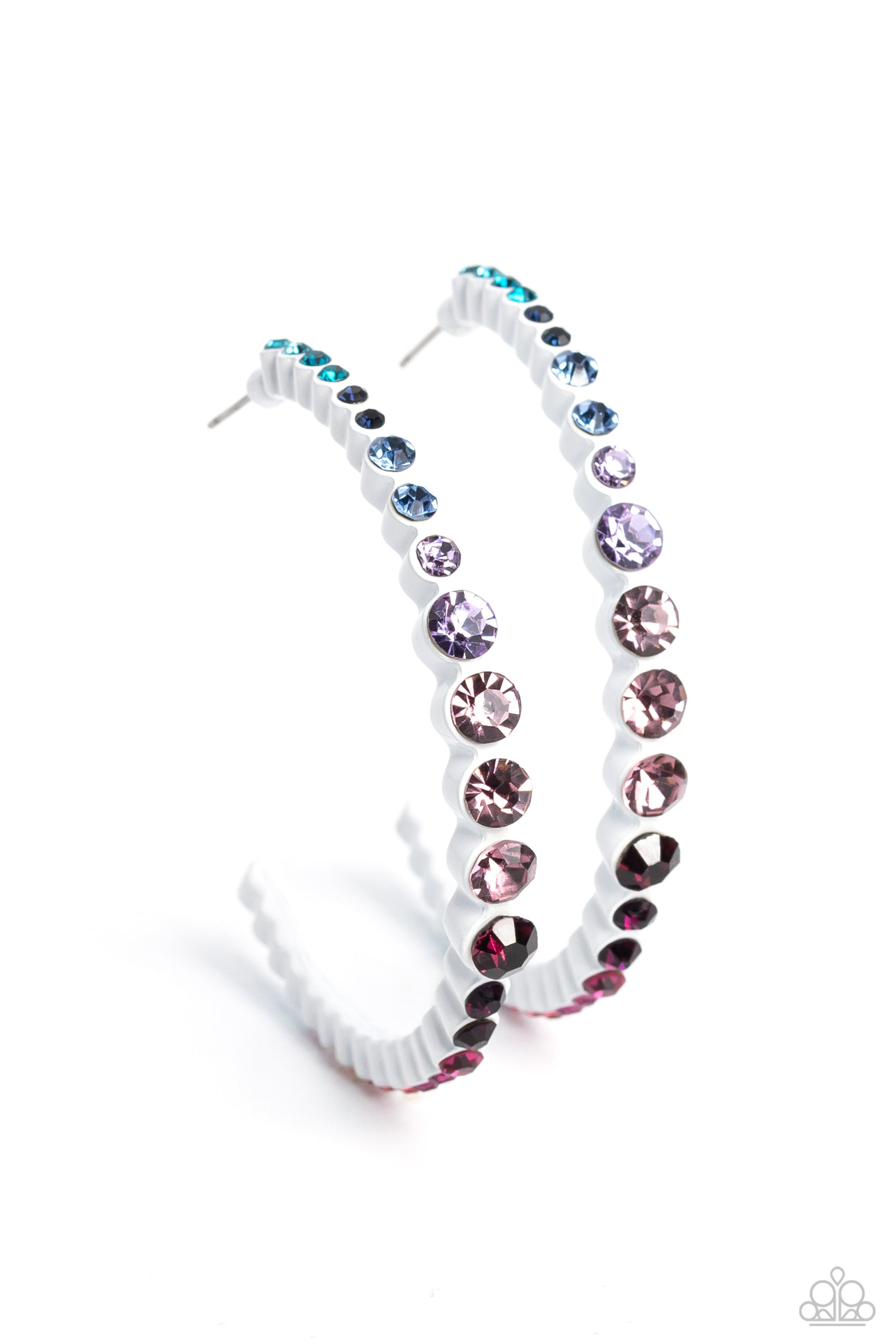Paparazzi Accessories Gossip CURL - Multi Falling in line, ombré rhinestones go from blue to purple to pink shades in varying sizes and are encased in white fittings as they curve into an oversized hoop. The vibrant white frames create a scalloped pattern