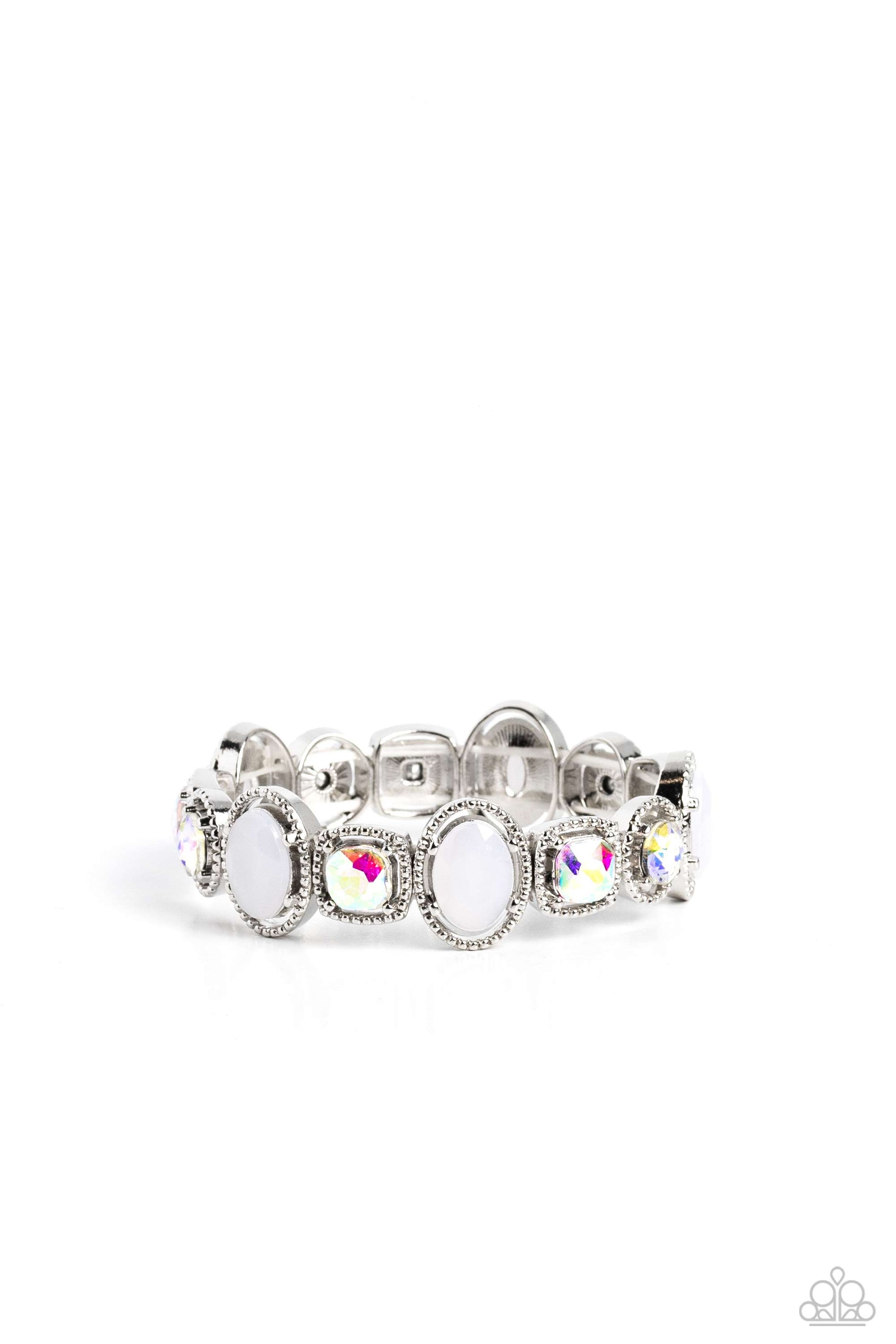Paparazzi Accessories Fashion Fairy Tale - White Pressed in the center of pronged and studded thick silver oval, circular, and square frames, iridescent gems and milky white beads alternate around the wrist on elastic stretchy bands for a refined, geometr