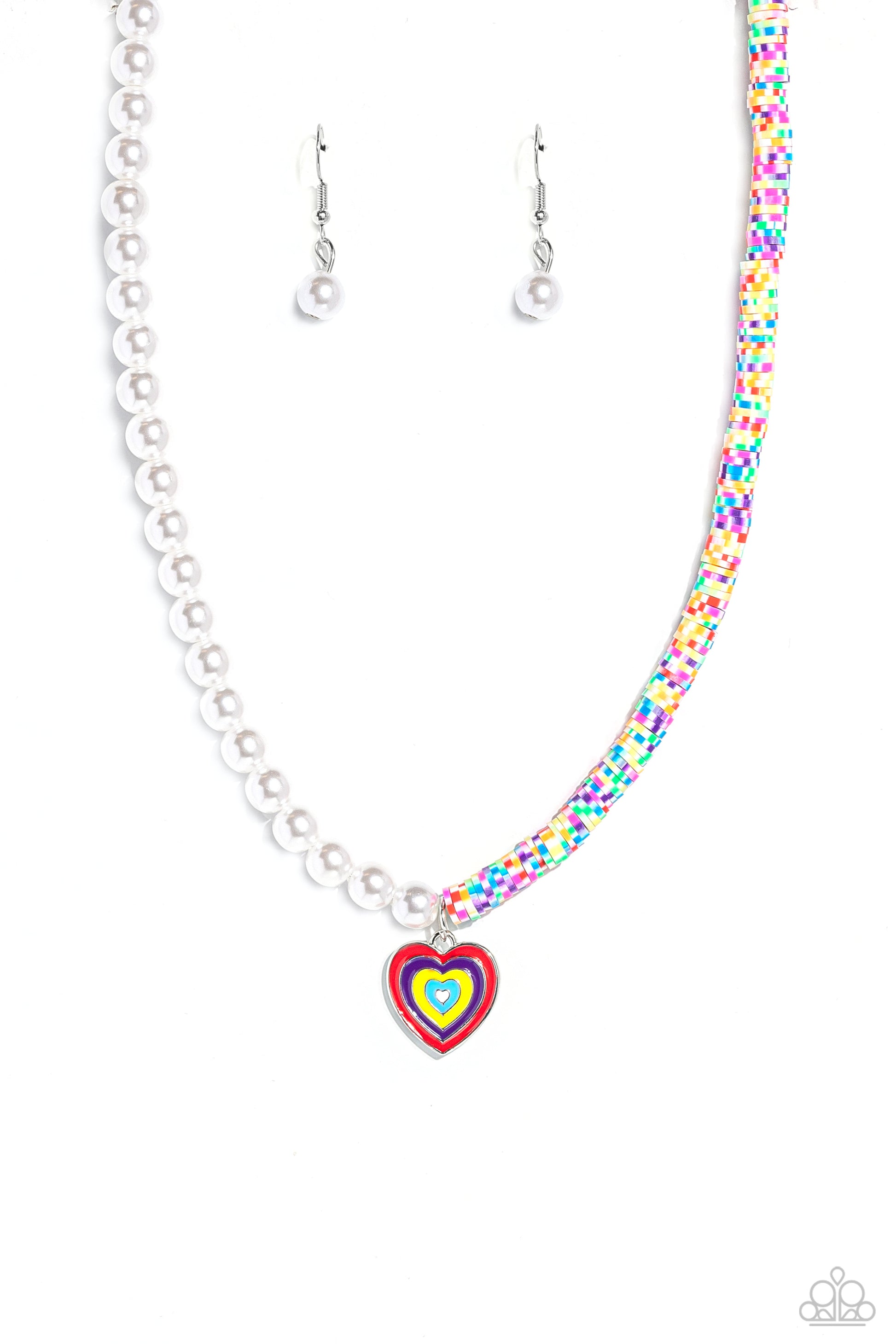 Paparazzi Accessories Precise Psychedelic - Multi A strand of gleaming white pearls and white clay discs striped with green, blue, purple, pink, red, orange, and yellow combine to create a half-and-half fashionable mashup down the neckline. A heart pendan