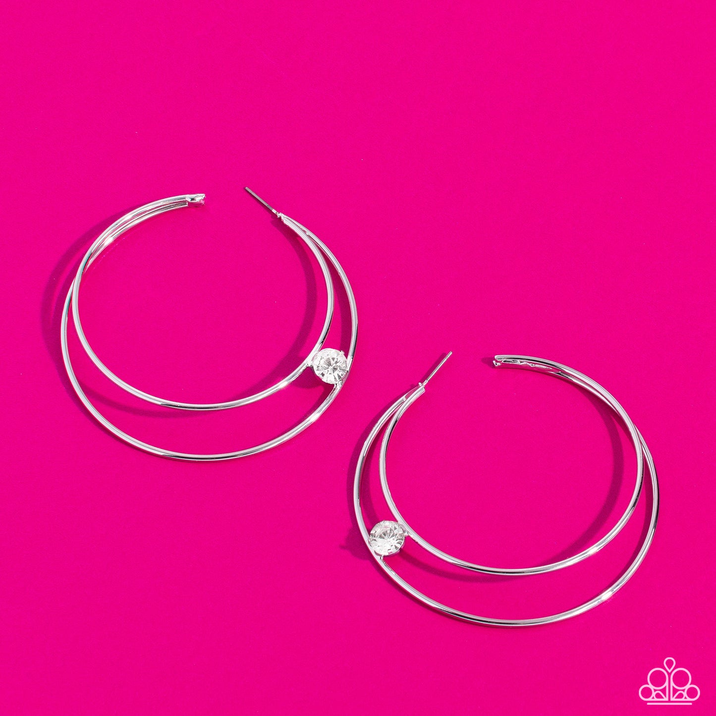 Paparazzi Accessories Theater HOOP - White Lodged between two dainty silver crescent frames that curve into double hoops, a faceted white rhinestone rests for a delicate shimmer near the ear. Earring attaches to a standard post fitting. Hoop measures appr